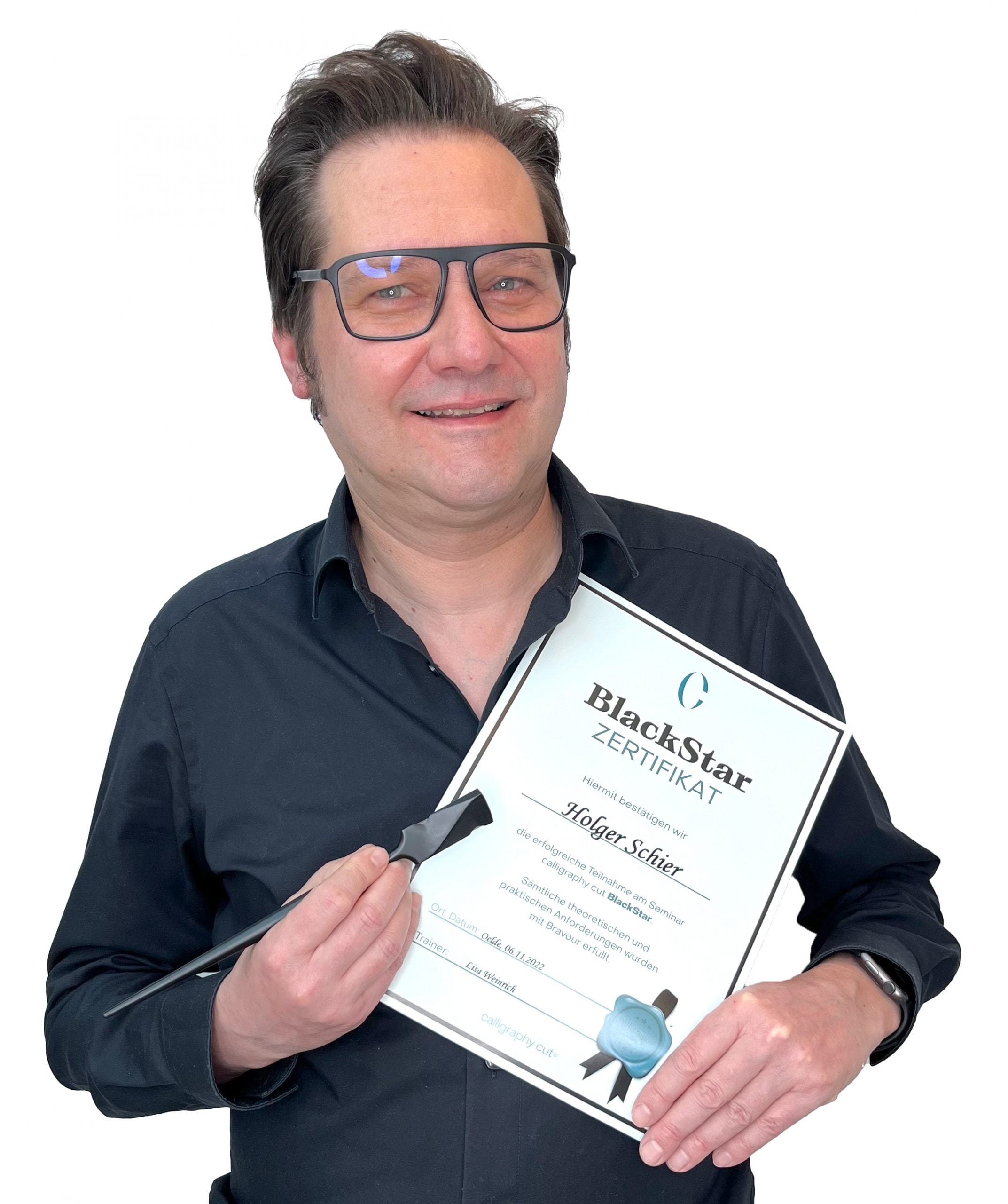 Holger Schier vom Cityfriseur in Heidenheim mit Zertifikat für Calligraphy Cut
